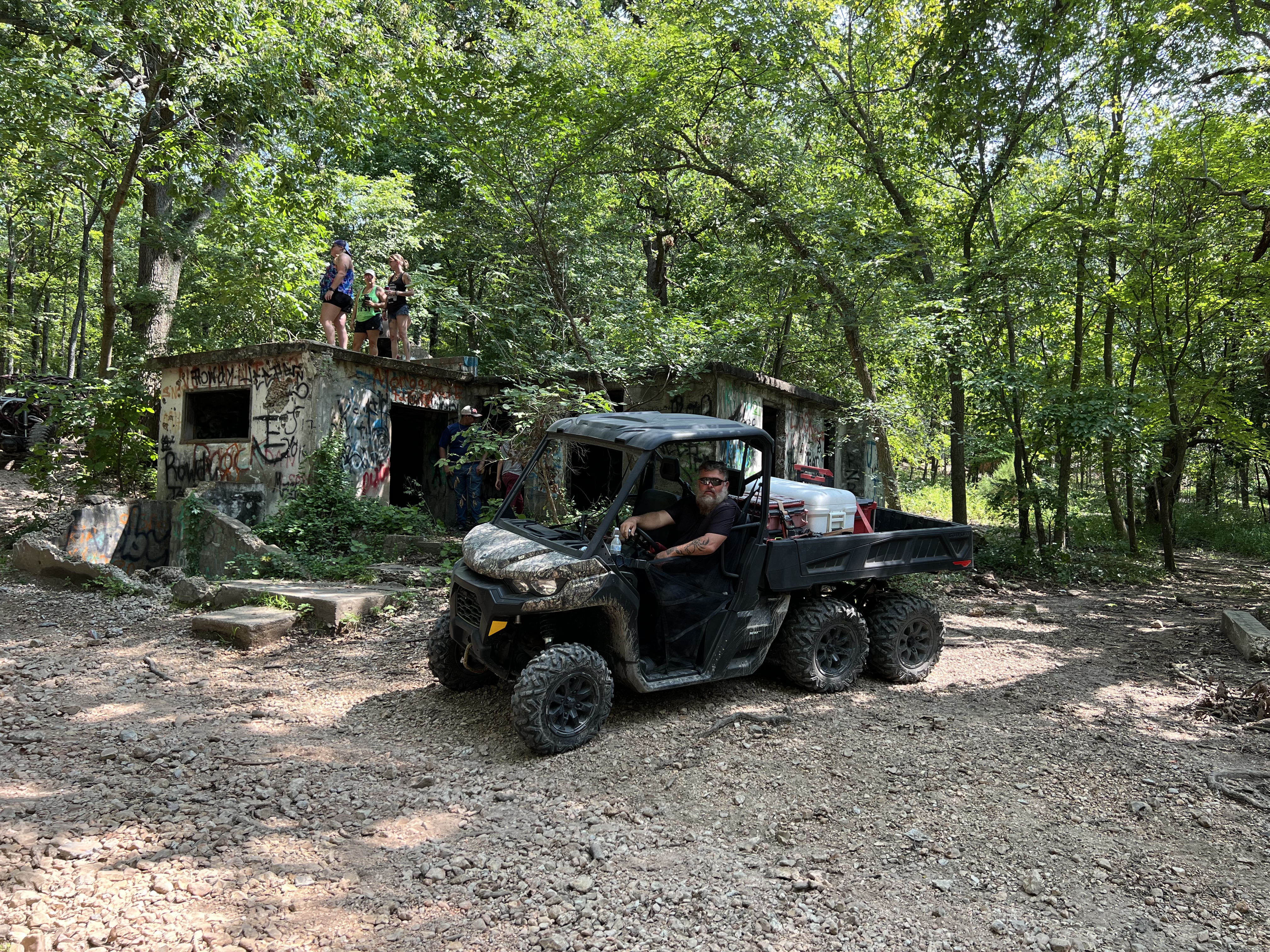 2023 Can-Am Defender HD10 6x6 in Mud